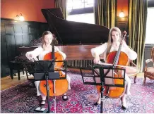  ??  ?? Award-winning cellists Luka and Ine Coatzee performed at the Lady Grey Tea at Lougheed House. The sisters usually perform as a trio with eldest sister Mari who could not be at the tea as she is currently studying at the prestigiou­s Juilliard School in New York City.