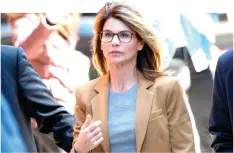  ?? — acP file photo ?? Lori Loughlin arrives to face charges on april P, 2019.