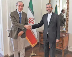  ?? Iran, Sunday. IRANIAN FOREIGN MINISTRY/AP ?? Enrique Mora, a leading European Union diplomat, left, met with top Iran nuclear negotiator Ali Bagheri Kani in Tehran,