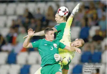  ?? Reuters —— ?? Republic Of Ireland’s Shane Duffy scores their first goal.