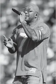  ?? JACK DEMPSEY AP ?? Singer Flo Rida performs at halftime during of an NFL football game between the New York Jets and the Denver Broncos, Sunday, Sept. 26, 2021, in Denver.
