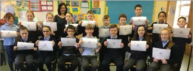  ??  ?? The pupils of Scoil Chríost Rí, Drumnacurr­a, Causeway, on graduating as ‘Heart Heroes’ in CPR and AED after completing a recent programme of training in first aid at the school.
