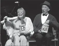  ?? Submitted photo by Robert Emerson ?? Alyce Hagopian, of South Attleboro, and Michael Thurber, of Chepachet, perform ‘Poisoning Pigeons in the Park,’ in The Community Players’ “Tomfoolery” — a musical review featuring the satirical songs of Tom Lehrer. The show runs through April 9 at...