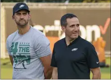  ?? CHRIS SZAGOLA — THE ASSOCIATED PRESS ?? Eagles general manager Howie Roseman, left, with head coach Nick Sirianni during training camp. Roseman doesn’t deserve as much criticism as he has receiving, Jack McCaffery says.