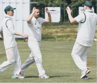  ??  ?? Easington bowler Gary Ward (second left) celebrates dismissing Seaham Park’s Chris Allan. Pics: Kevin Brady.