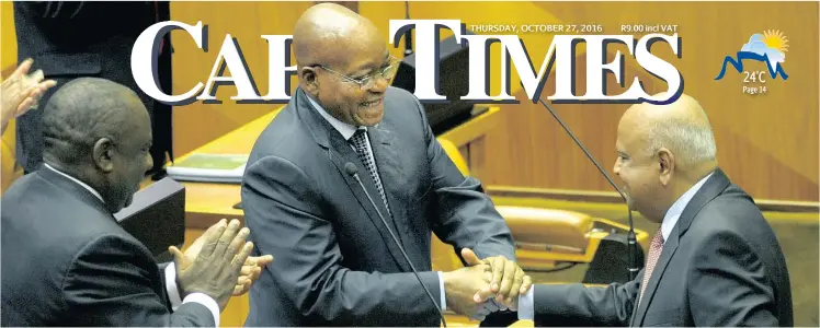  ?? Picture: JEFFREY ABRAHAMS ?? APPLAUSE: Finance Minister Pravin Gordhan received a standing ovation in Parliament after delivering his Medium-term Budget Policy Statement in Parliament yesterday, and was warmly congratula­ted by President Jacob Zuma.