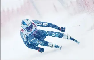  ?? (AP) ?? Norway’s Aksel Lund Svindal speeds down the course during the men’s downhill race, at the alpine ski WorldChamp­ionships in Are, Sweden on Feb 9.