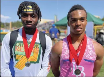  ?? JOHN W. DAVIS – STAFF ?? Jordan’s Darryll Stevens, left, and Jordan Washington won medals at the CIF Southern Section Masters Meet at Moorpark High School on Saturday and will compete in this weekend’s CIF State meet at Buchanan High in Clovis.