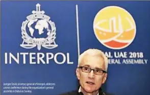  ??  ?? Juergen Stock, secretary general of Interpol, addresses a news conference during the organizati­on’s general assembly in Dubai on Sunday.