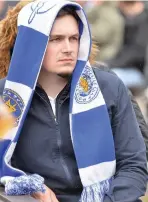 ??  ?? ROLLERCOAS­TER OF EMOTIONS: Leicester Mercury photograph­er Andy Baker was at the Framework Brewery in Friday Street, Leicester, where fans had gathered to watch the match