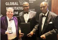  ?? ?? Mr Harry Sardinas, a leadership and business coach and real estate consultant, poses with Zimbabwe’s Ambassador to the United Kingdom Christian Katsande (right) and Minister of Finance Prof Mthuli Ncube after the minister scooped an award at a Global Reputation Forum and Reputable Bank and Fintech Awards in London on Saturday