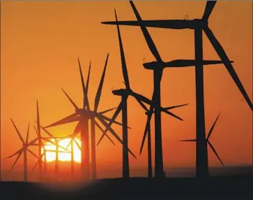  ?? Bob Chamberlin Los Angeles Times ?? UNDER SB 100, California must obtain all of its electricit­y from clean sources, such as wind and solar, by 2045.