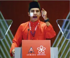  ??  ?? Syed Saddiq gestures during his policy address at the annual gathering of Armada at PICC. — Bernama photo