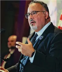  ?? ?? U.S. Secretary of Education Miguel Cardona, a Meriden native, addresses those who attended The New American Dream Foundation’s annual awards gala. Cardona described the ability to speak multiple languages as a “superpower.”