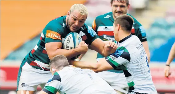  ??  ?? Hard yards: Leicester prop Ellis Genge charges into contact with the Newcastle defence as his team stutter towards a scrappy victory over the out-of-form visitors at Welford Road
