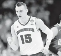  ?? Charlie Neibergall Associated Press ?? SAM DEKKER was slowed by an ankle injury suffered in October, and some were critical about the pace of his developmen­t.