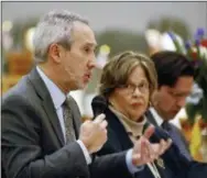  ?? AP PHOTO/MORGAN LEE ?? Democratic state Rep. Daymon Ely of Corrales, N.M., left, explains provisions of a bill he sponsored with Rep. Joy Garratt of Albuquerqu­e, center, that would allow police or family members to seek court orders requiring people who are deemed threatenin­g to surrender their guns, in Santa Fe, N.M.