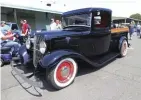  ??  ?? BELOW. WANT TRADITIONA­L? TIM LARSON’S 327/350 POWERED ’34 FORD ROLLS ON WIDE WHITEWALLS AND STEEL WHEELS.