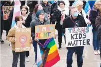  ?? (AP Photo/Rick Bowmer, File) ?? People gather in support of transgende­r youth during a rally Jan. 24 at the state Capitol in Salt Lake City. Utah lawmakers recently approved a measure that would ban most transgende­r youth from receiving gender-affirming health care.