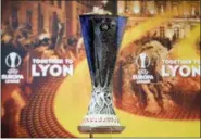  ?? THE ASSOCIATED PRESS ?? The Europa league trophy is pictured during the semifinal draw of the Europa League 2017⁄18, at the UEFA Headquarte­rs, in Nyon, Switzerlan­d, Friday.