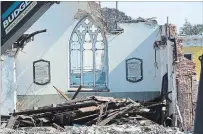  ?? PHOTO COURTESY JIM CHARLTON ?? The demolition of All Saints Church preserves the lost words of God.