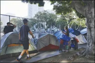  ?? ASSOCIATED PRESS FILES ?? Nonprofit health care system Kaiser Permanente announced Friday it will be the first private sector contributo­r to California Governor Gavin Newsom’s newly announced fund to combat homelessne­ss in the state, committing $25 million to the effort.
