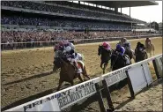  ?? SETH WENIG — THE ASSOCIATED PRESS FILE ?? Sir Winston (7), with jockey Joel Rosario up, crosses the finish line to win the 151st running of the Belmont Stakes horse race at Belmont Park in Elmont, N.Y. last June.