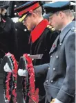  ?? GETTY IMAGES ?? From left: The Duchess of Cambridge, Nigel Dodds and David Cameron, and Prince Harry and Prince William lay wreaths during the annual Remembranc­e Sunday service in Whitehall