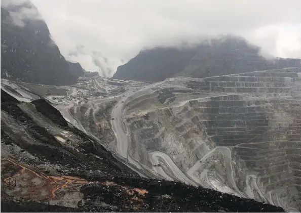  ?? OLIVIA RONDONUWU/AFP/GETTY IMAGES FILES ?? Indonesia’s remote Papua province is home to Freeport-McMoRan’s Grasberg mining complex. Many mining firms with assets in emerging economies are talking about diversifyi­ng their risks as the countries also want to profit from metal’s surge.