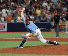  ?? Scott Audette/Associated Press ?? ■ Tampa Bay Rays pitcher Emilio Pagan works from the mound against the Yankees during the ninth inning Sunday in St. Petersburg, Fla.