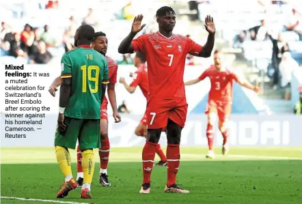  ?? — reuters ?? Mixed feelings: it was a muted celebratio­n for Switzerlan­d’s breel embolo after scoring the winner against his homeland Cameroon.