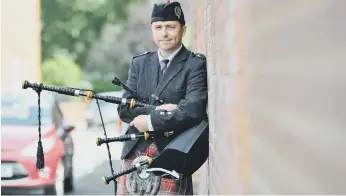  ??  ?? Bagpiper Alan Jamieson has now moved from Roker, without ever finding out who sent him abusive letters.