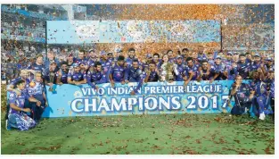  ??  ?? Indians pose with the trophy after wining the Indian Premier League (IPL) cricket final match against Rising Pune Supergiant in Hyderabad, India, on Sunday. (AP)