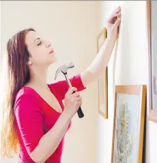  ?? GETTY IMAGES/ISTOCKPHOT­O ?? Use painter’s tape and paper templates of the frames you want to hang on a gallery wall to get an idea of how the art or photos will look assembled — and before you put nails in the wall.