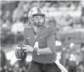  ?? GRACE RAMEY/AP ?? Western Kentucky quarterbac­k Bailey Zappe looks to pass the ball against Middle Tennessee during a game in Bowling Green, Ky.