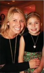  ??  ?? Kim Coulson and daughter, Hope Macaione, await the matinee performanc­e.