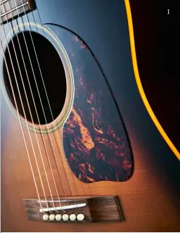  ??  ?? 1. The colours of the faux tortoisesh­ell pickguard, bronzed toner to enrich the lacquer finish, and the subtle grain of the Santos rosewood bridge create a glorious mix of warm earth tones 1