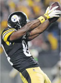  ?? DON WRIGHT/THE ASSOCIATED PRESS ?? Steelers’ Antonio Brown celebrates after scoring a touchdown Sunday. Brown was penalized for the celebratio­n.
