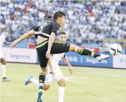  ??  ?? SAN PEDRO: Mexico’s Raul Jimenez controls the ball during the Russia 2018 FIFA World Cup Concacaf Qualifiers football match, in San Pedro Sula, on Tuesday. — AFP