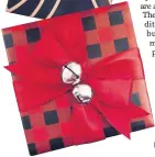  ??  ?? Go the half-and-half route to save time — wrap half your gifts in paper and enclose the other half in decorative boxes or bags.