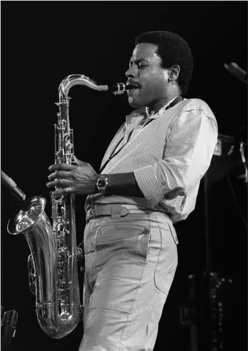  ?? ERIC GAILLARD — AFP/GETTY IMAGES ?? U.S. jazz saxophone player Wayne Shorter, leader of the jazz rock band Weather Report, plays on July 18, 1984, during the 25th Jazz Festival in Juan-les-pins.