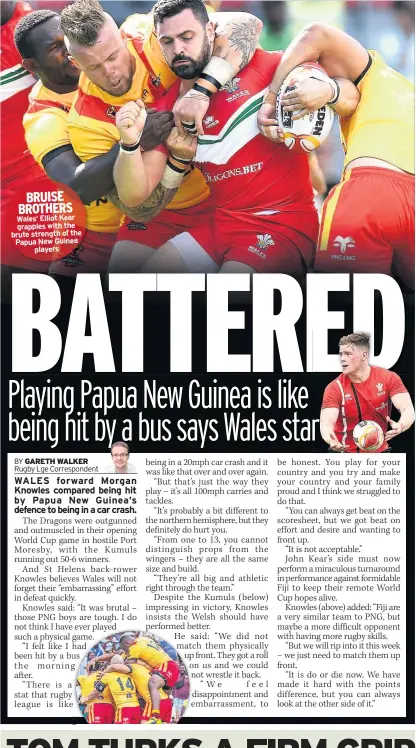  ??  ?? BRUISE BROTHERS Wales’ Elliot Kear grapples with the brute strength of the Papua New Guinea players