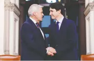  ?? SEAN KILPATRICK/THE CANADIAN PRESS ?? Prime Minister Justin Trudeau meets with Newfoundla­nd and Labrador Premier Dwight Ball on Parliament Hill in Ottawa on Tuesday.