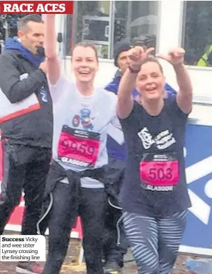  ??  ?? Success Vicky and wee sister Lynsey crossing the finishing line