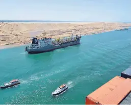  ?? FOTO: REUTERS/NTB SCANPIX ?? ÅPNER I DAG: Den nye Suez-kanalen vil korte ned ventetiden med om lag sju timer.
