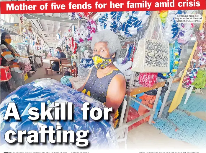  ?? Picture: RAMA ?? Seremaia Kidia selling wreaths at Nausori Market.