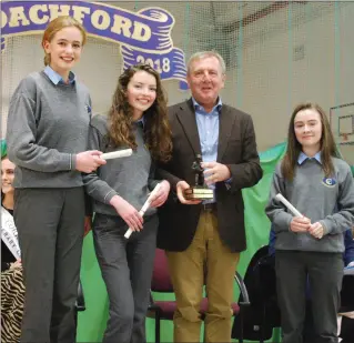  ??  ?? Junior cert award winners, Aoife McCarthy, Kate Donovan, Ellie O’ Connell with Minister Creed.