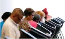  ??  ?? Voters cast their ballots in Charlotte, North Carolina, in 2016. The state’s felon disenfranc­hisement statute has been used as a tool to prevent African Americans from voting. Photograph: Chris Keane/Reuters