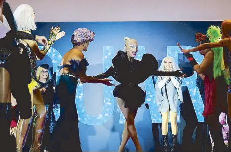  ??  ?? Winners of The Search for Big Drag Energy open the stage for Aquaria.