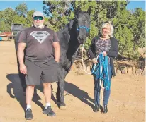  ?? COURTESY PHOTO ?? The D’Anticos show off Zorro, a horse they adopted from The Horse Shelter.